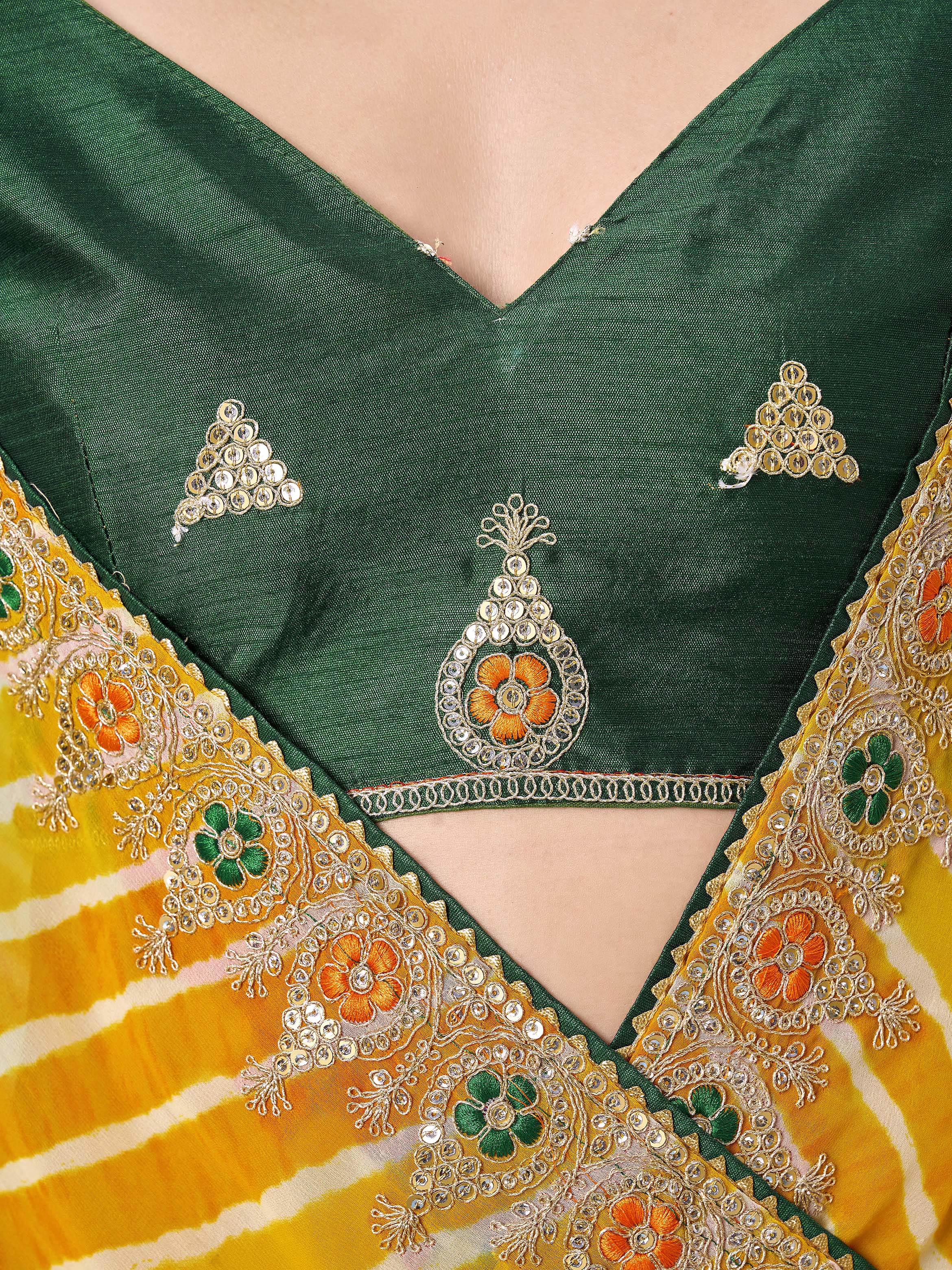 Yellow colored leheriya printed embroidered saree